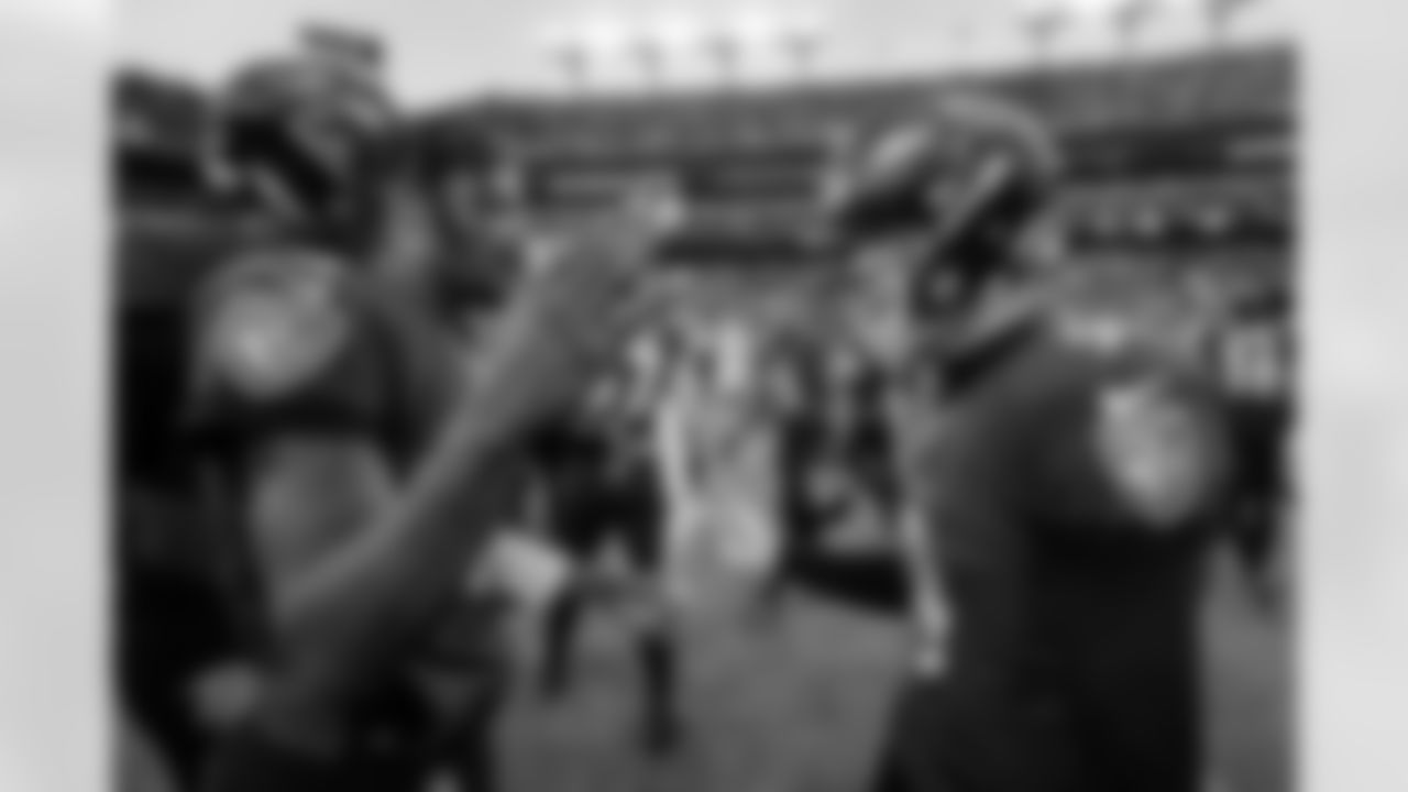 QB Lamar Jackson congratulates K Justin Tucker on his game winning field goal kick